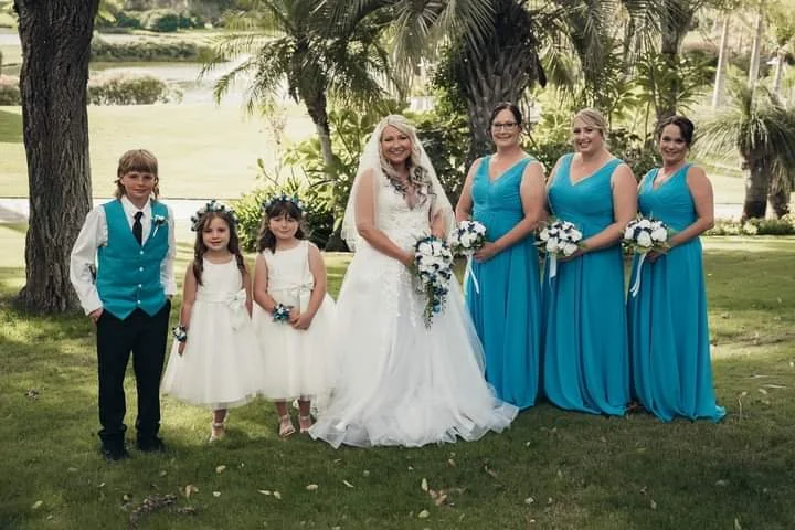 White wedding dress with 2025 teal accents